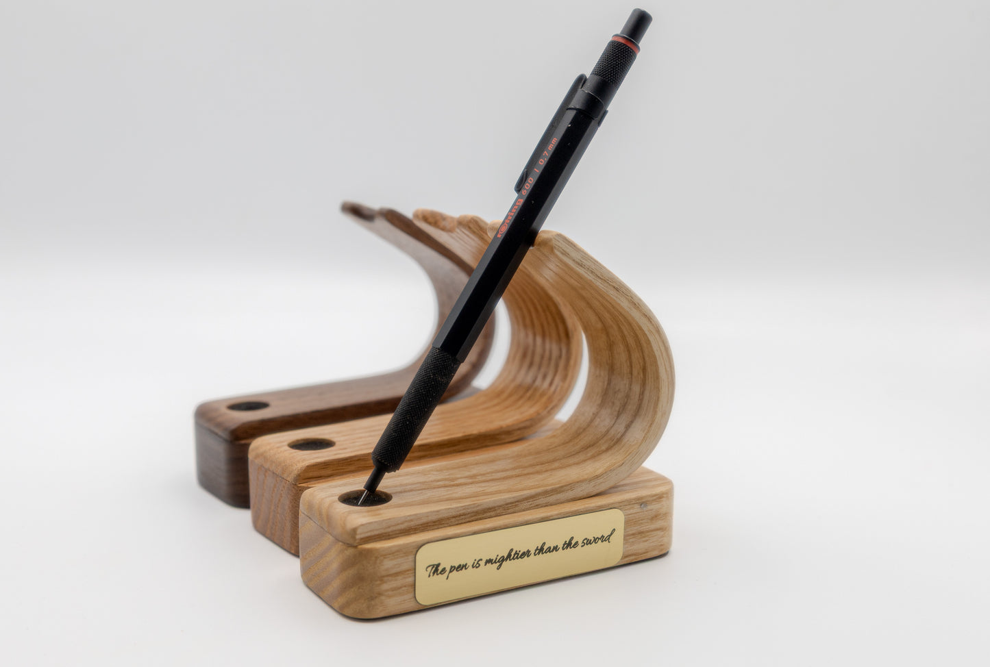Elegant desk display featuring walnut pen holder